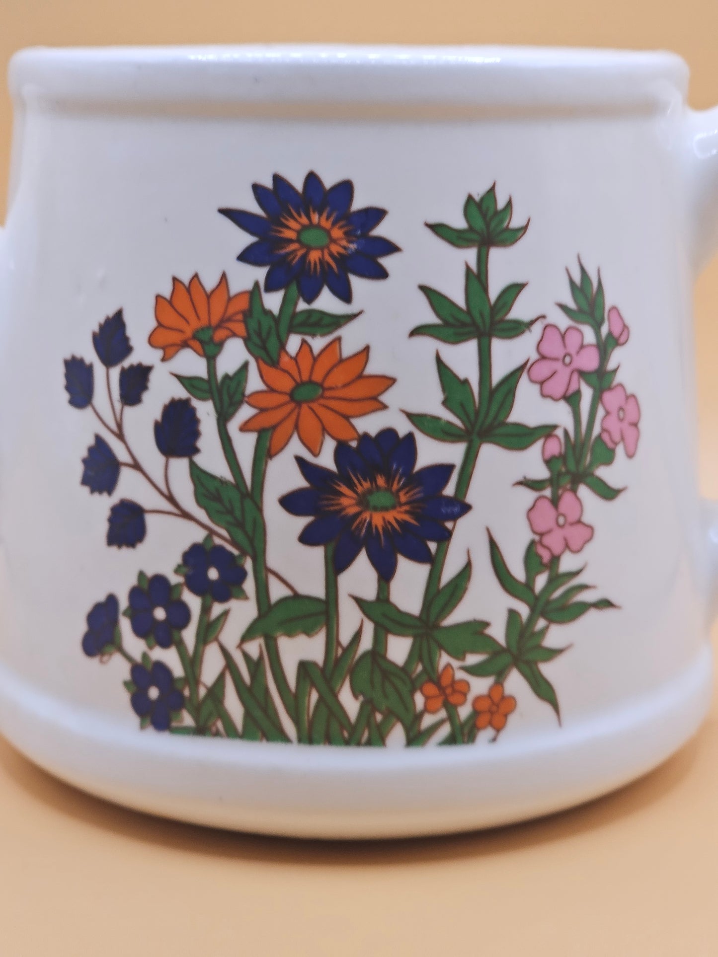 Ceramic Water Pail with Pink, Blue, and Orange Blossoms| 12 oz Candle